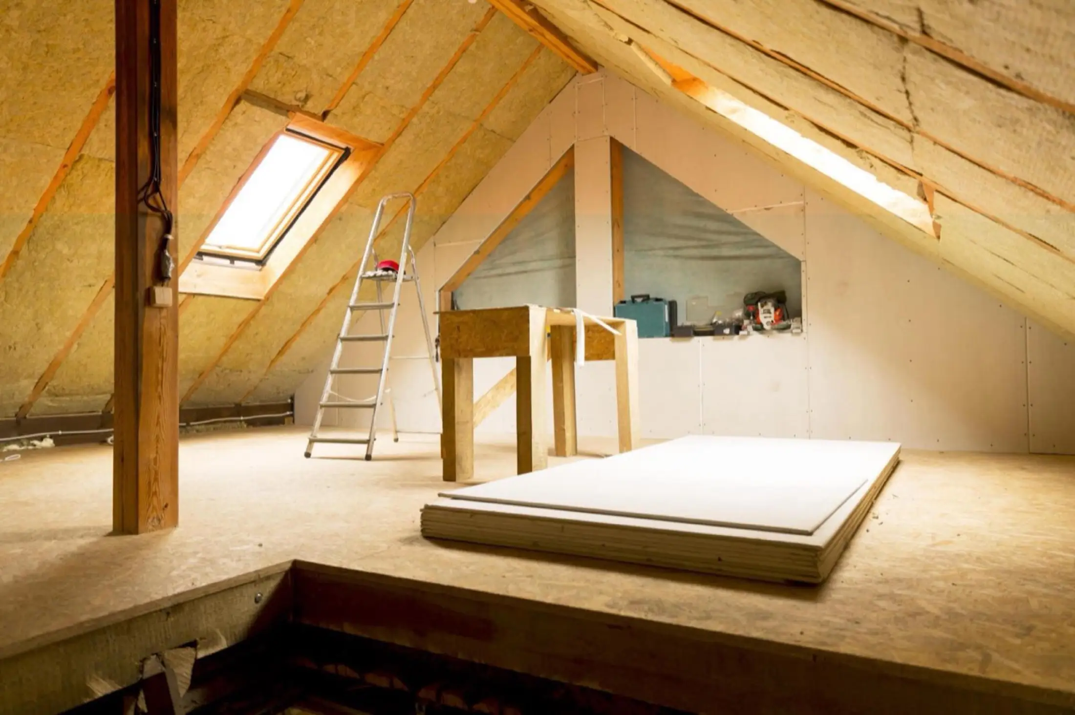 Pole barn interior with finished foam coverage